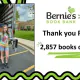 pictured: Ryleigh stands outside a truck of donated books - text: Thank you Ryleigh! 2,857 books collected