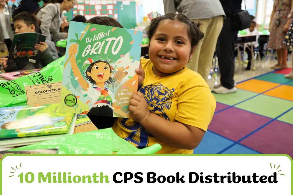 pictured: a kid smiles and holds the book The Littlest Grito - text: 10 millionth CPS book distributed