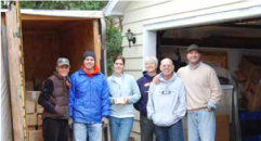 six of Bernie's Book Bank founders pose together in 2009