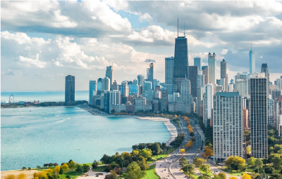 aerial view of downtown Chicago featuring the Hancock tower, Lake Shore Drive, and Lake Michigan