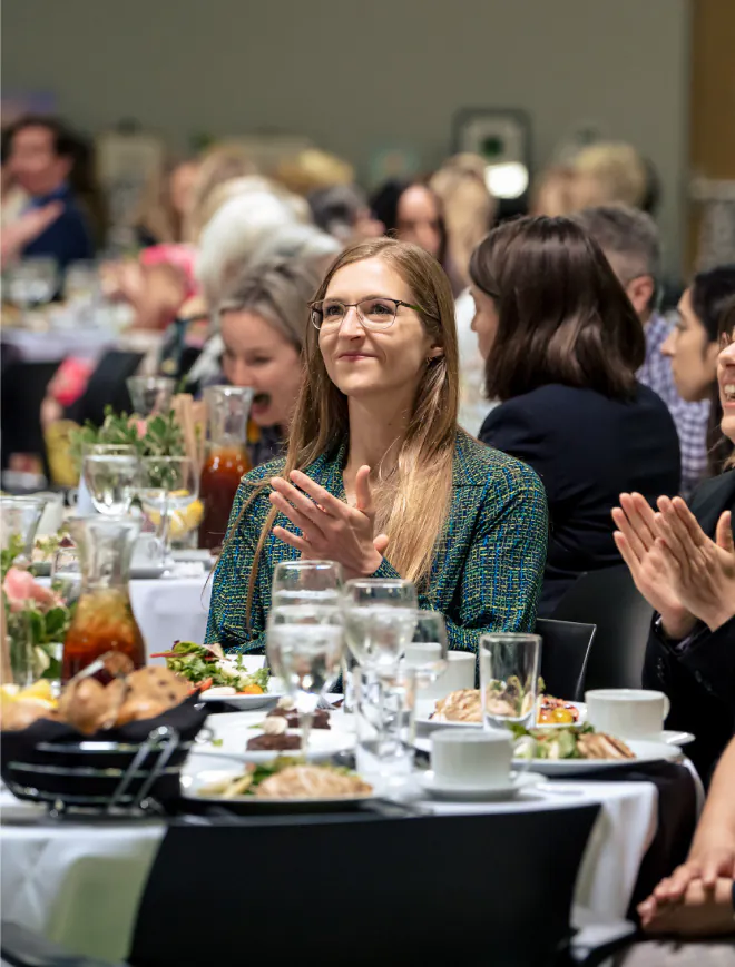 attendees at a white cloth fundraisre