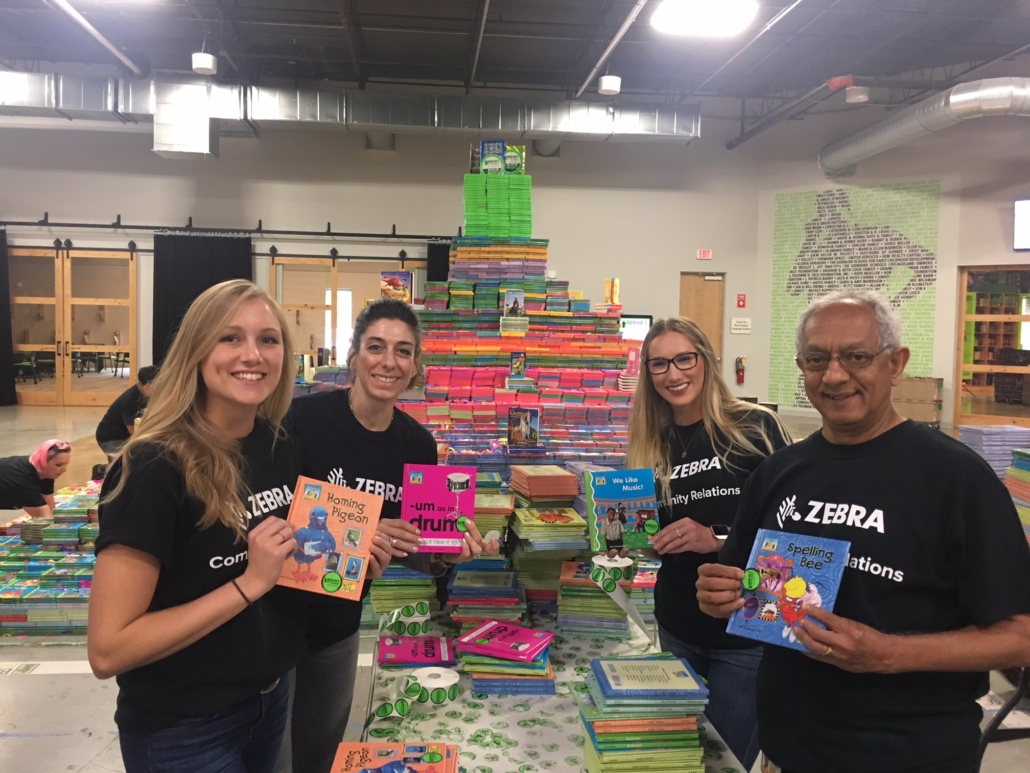 Corporate volunteers pose