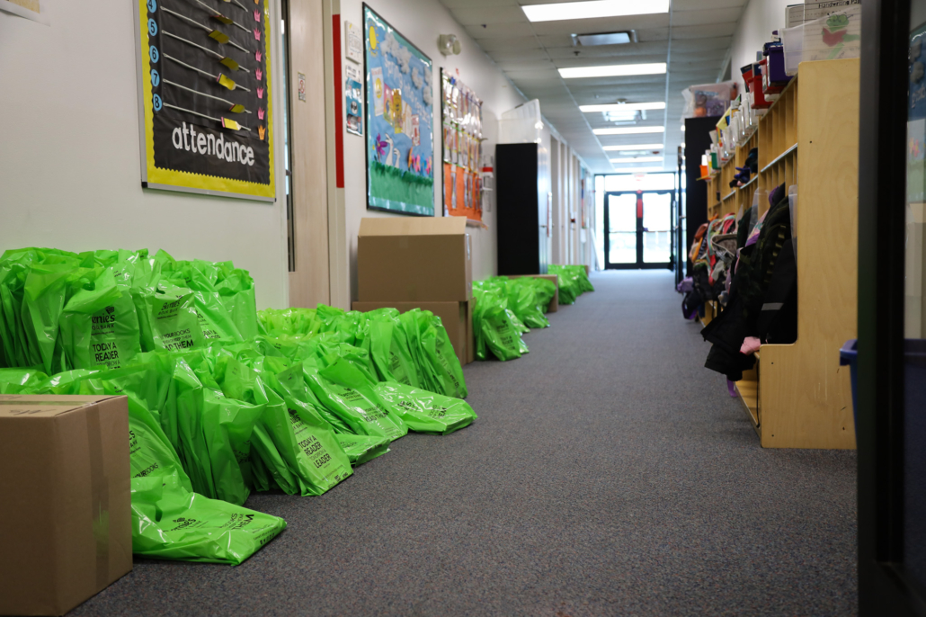 Bernie's book bags fill a school hallway