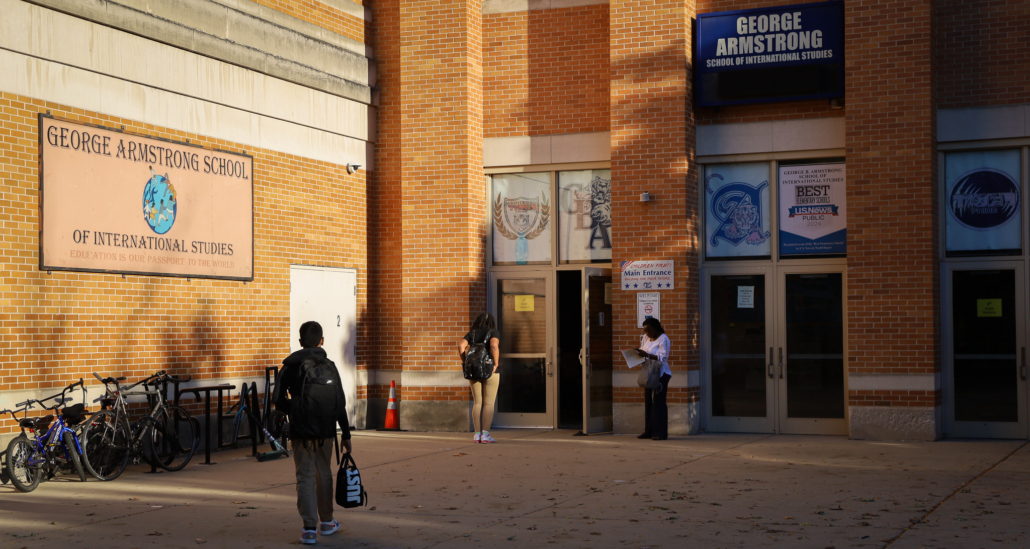 three kids outside of George Armstrong school