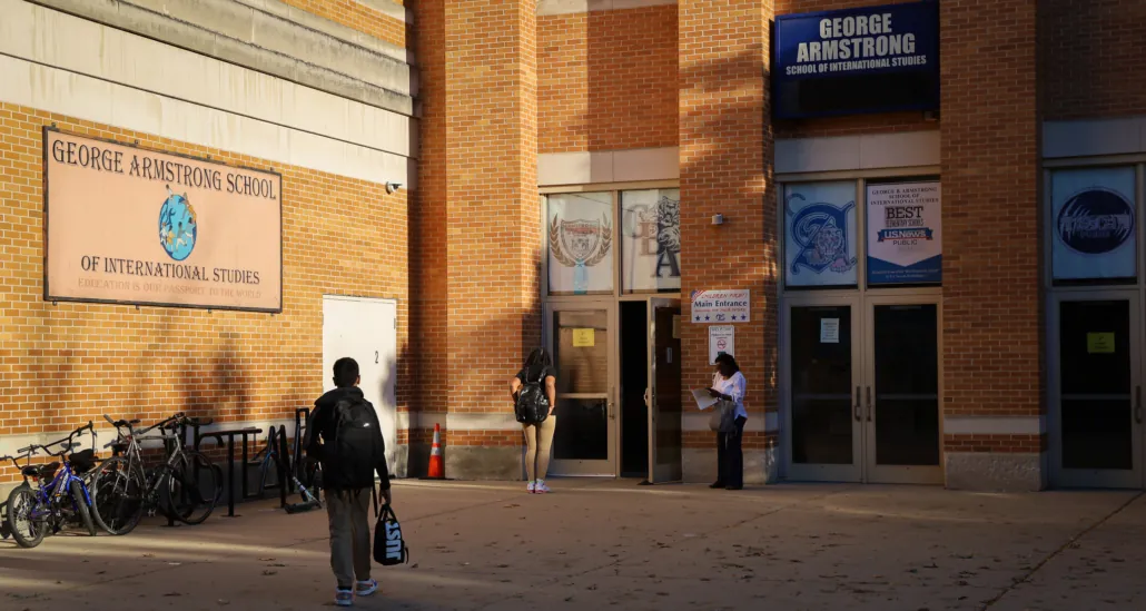 three kids outside of George Armstrong school