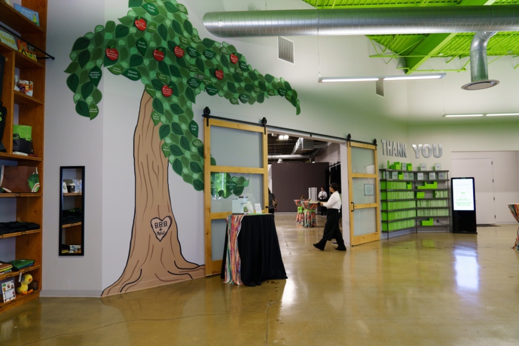 The Bernie's Book Bank Giving Tree painted against the office wall