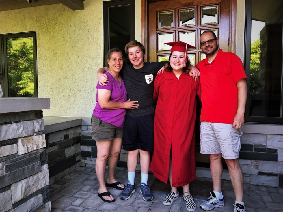 The Wilkov family poses and smiles